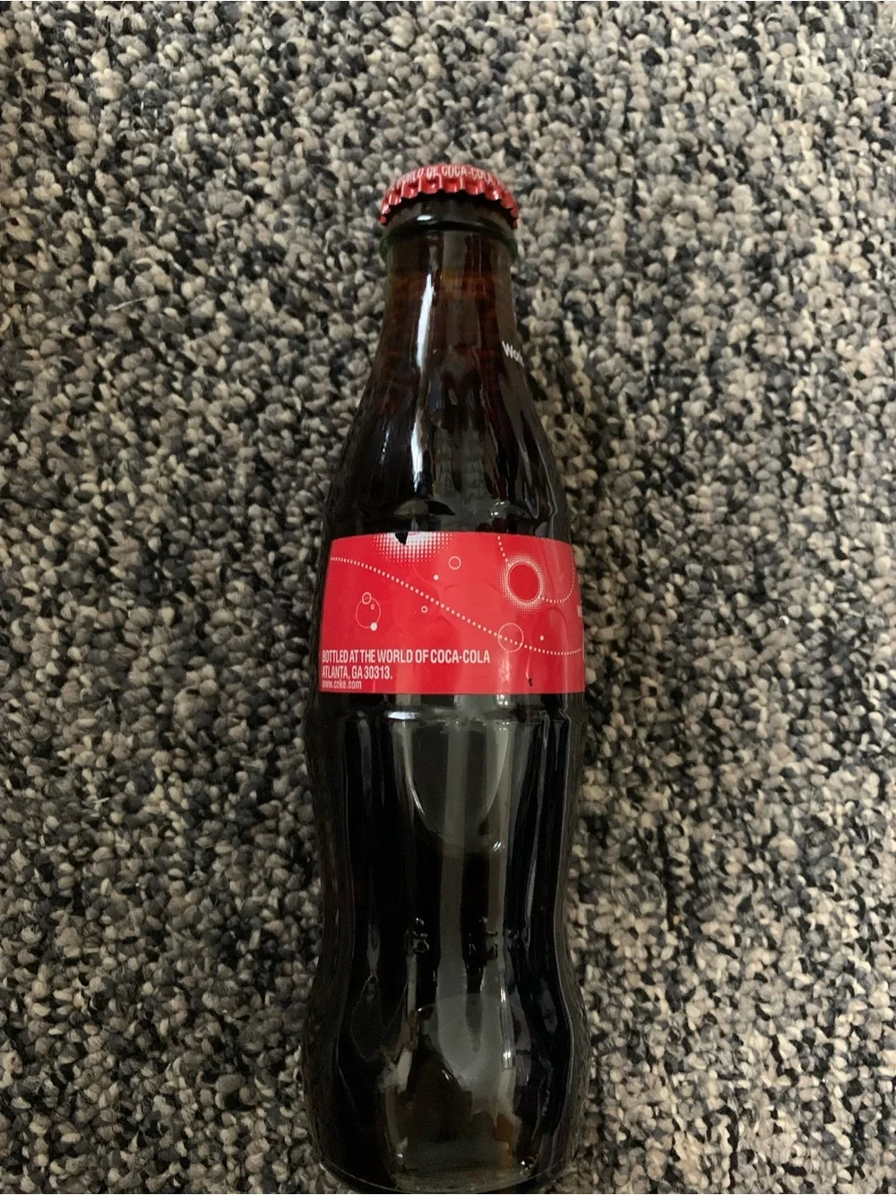vintage Coca-Cola classic glass bottle bottled at the world of coca-cola in 2013